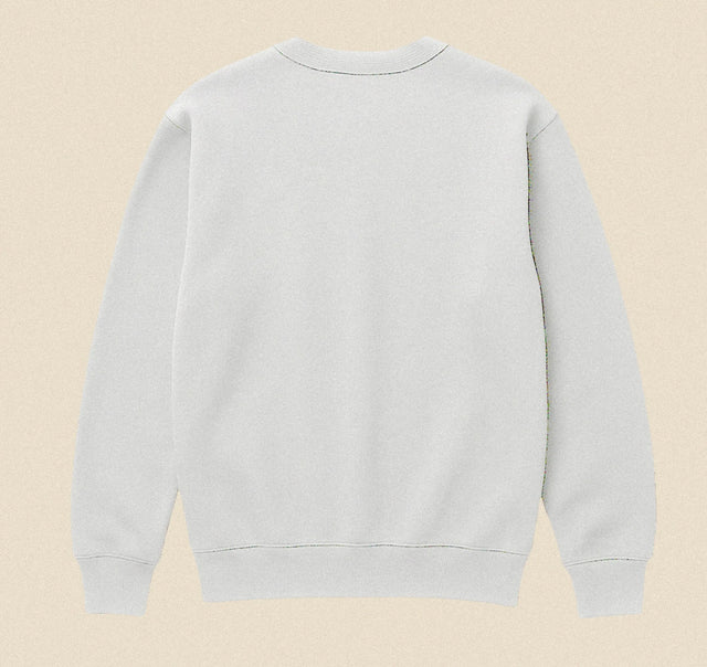 Light blue sweatshirt on a beige background